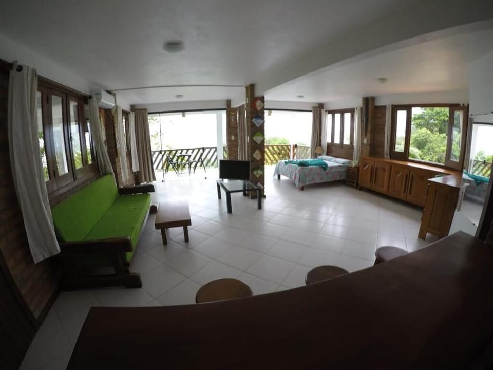 Deluxe Bungalow, Sea View | Living area | 40-inch Smart TV with digital channels