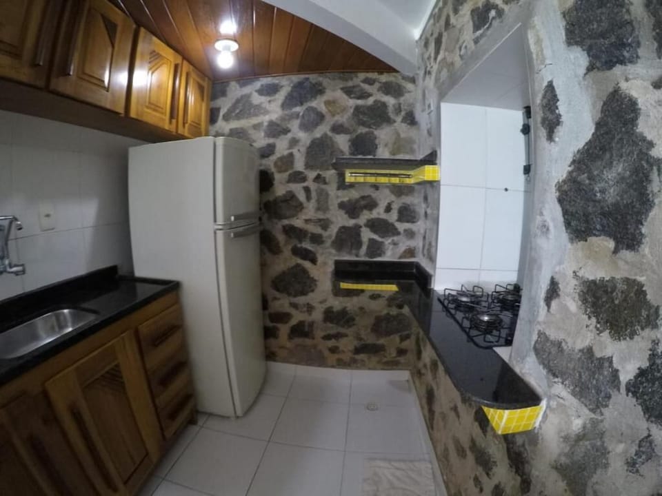 Deluxe Bungalow, Sea View | Private kitchen | Fridge, oven, cookware/dishes/utensils, dining table
