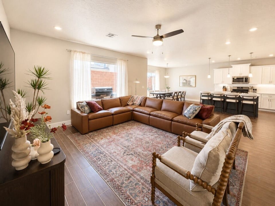 Downstairs Living Room with 75` Smart TV and Ample Seating