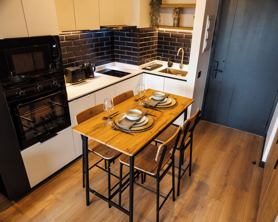 Standard Apartment, Balcony, City View | Dining