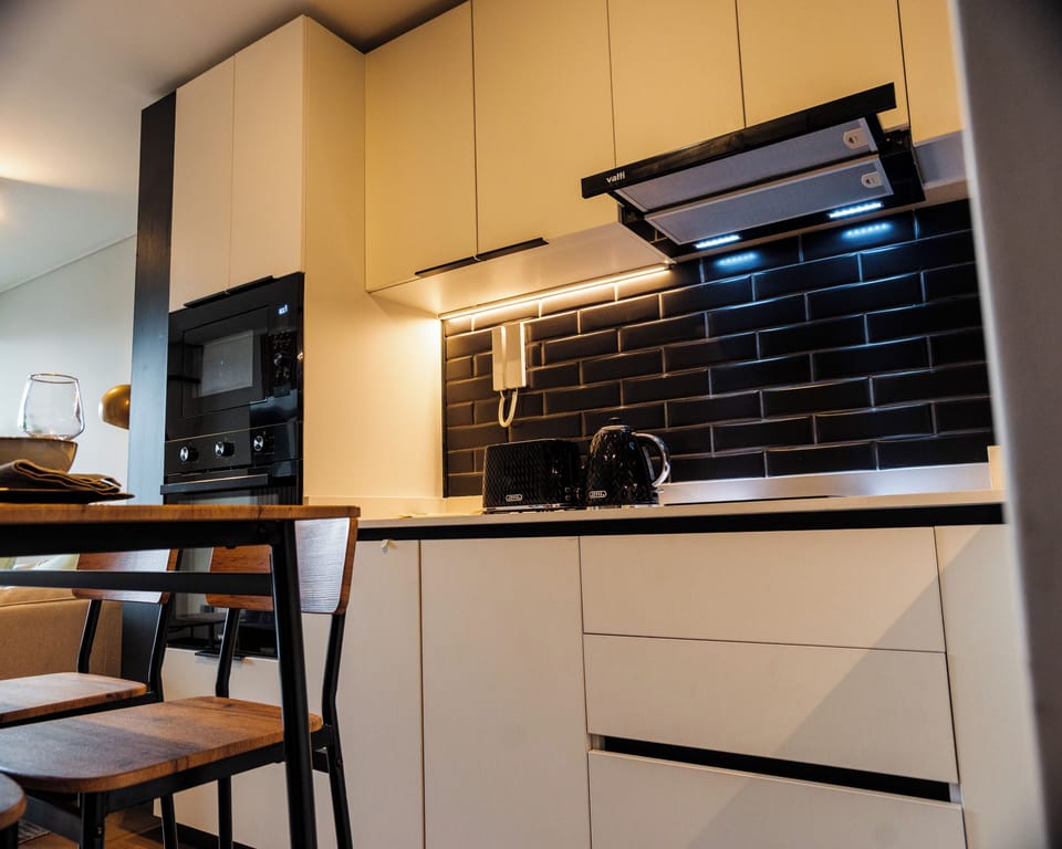 Standard Apartment, Balcony, City View | Private kitchen | Fridge, microwave, oven, stovetop