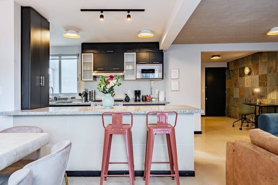 Pull up a stool at the breakfast bar and enjoy a conversation while meals come together.