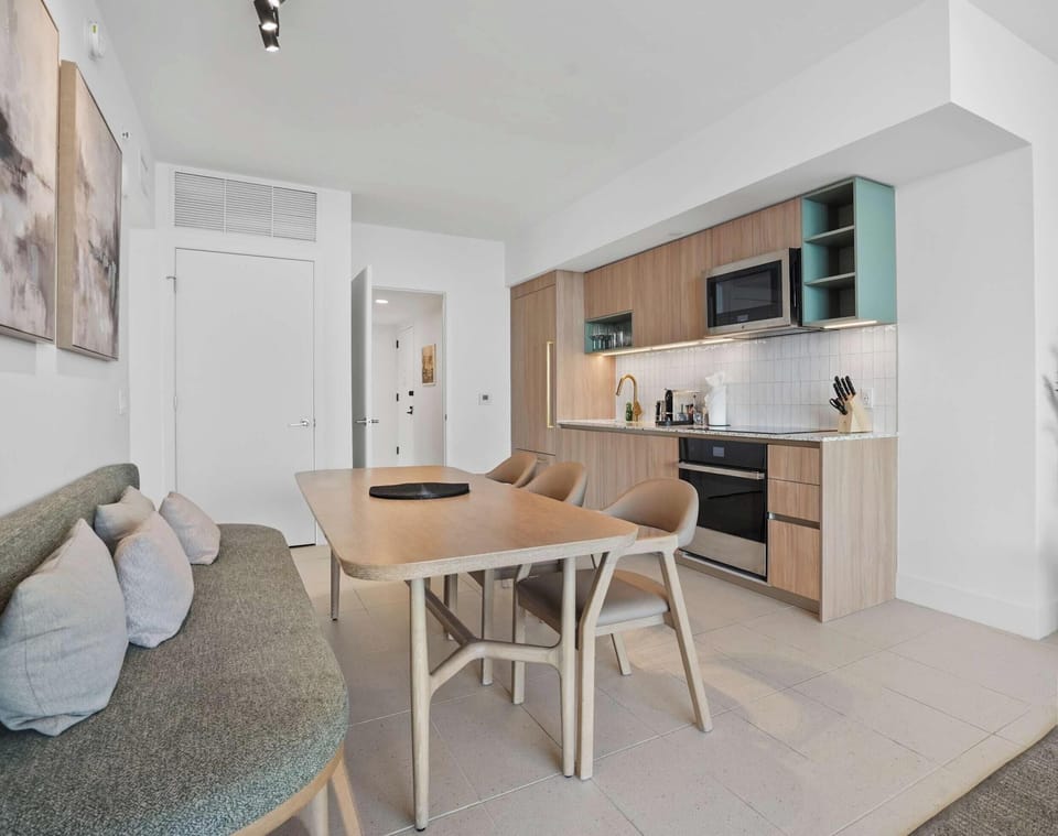 Open kitchen and dining area with modern finishes.