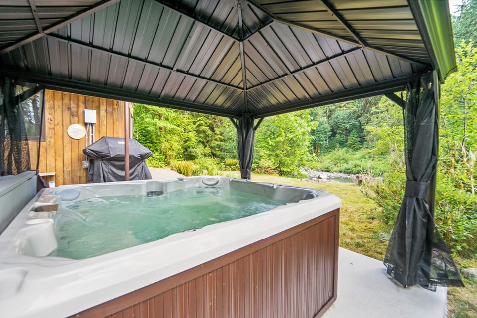 Soak in the hot tub after a good river rinse, or watch the storms pass 