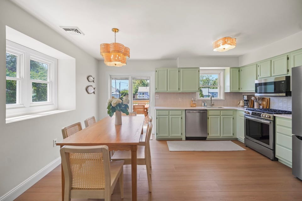 Share meals together in the bright dining area beside the kitchen.