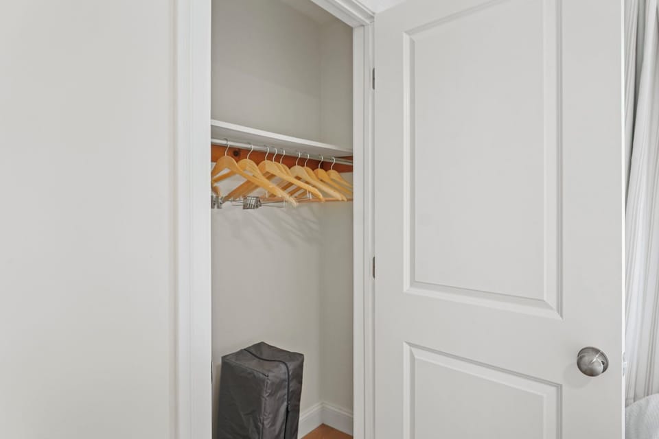 A full closet with hangers keeps clothes organized throughout your stay.