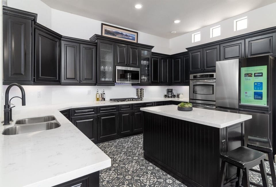Gather around the oversized island for coffee, cocktails, or planning your Scottsdale adventures.