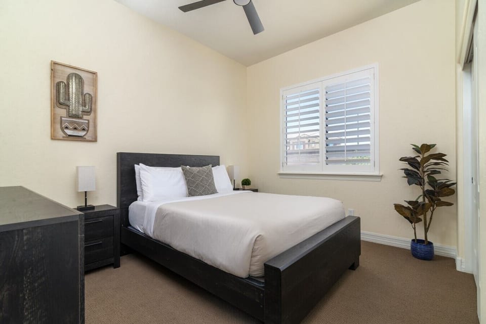 Bright and comfortable queen bedroom designed for restful nights.