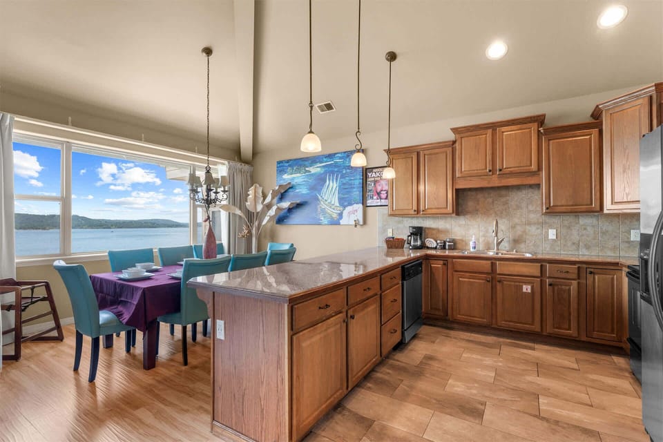 The open kitchen offers ample space & all the comforts of home​
