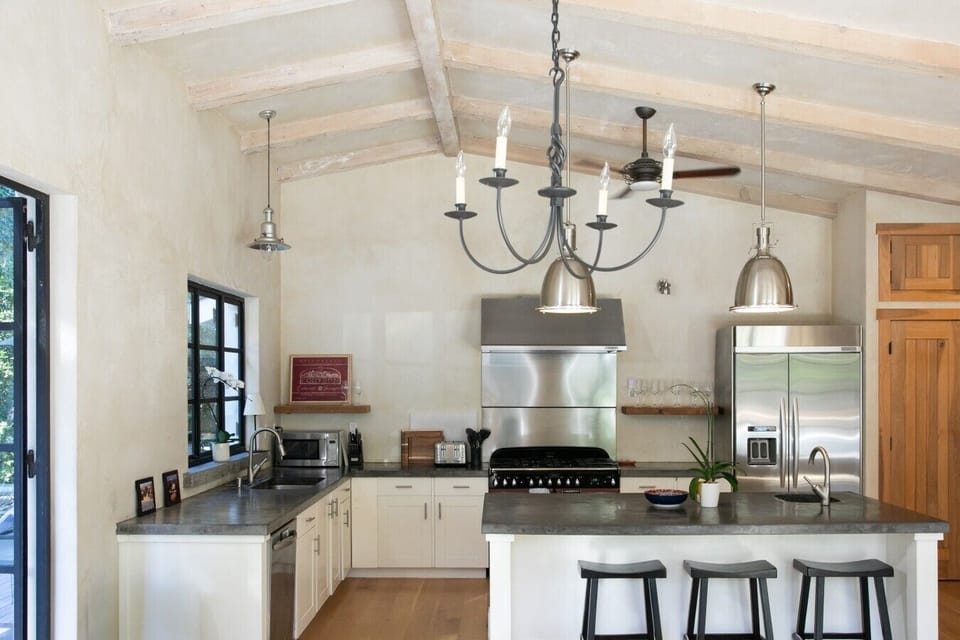 A bright, modern, spacious kitchen with an open layout.