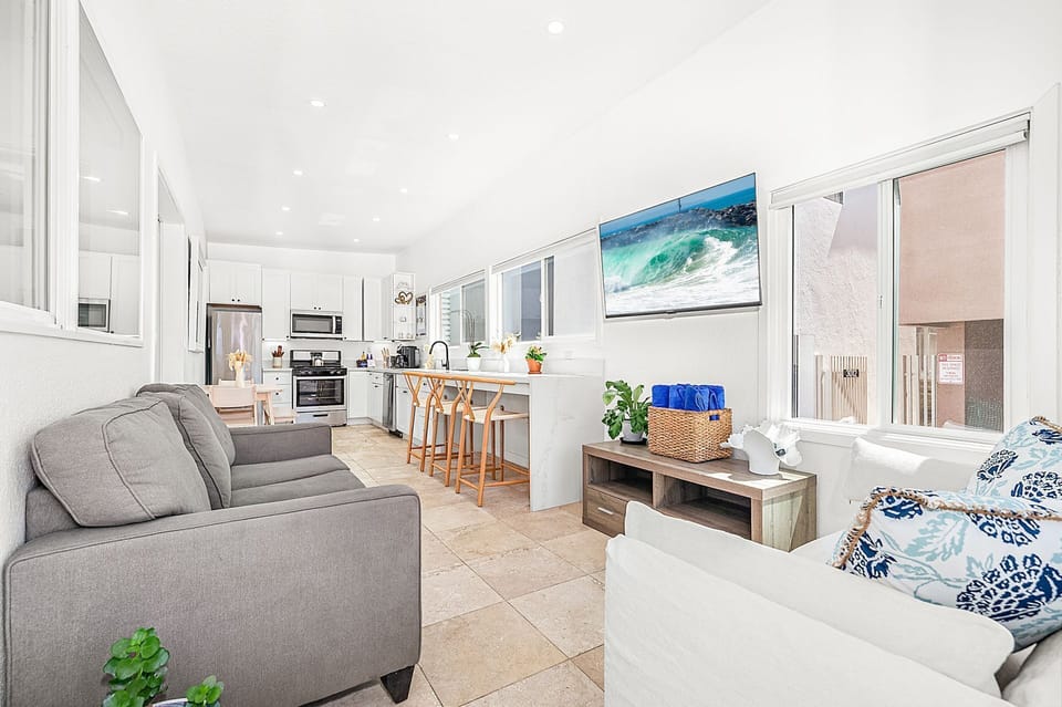 Bright, open living spaces make it easy to relax after a day at the beach
                