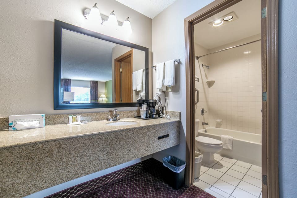 Double Room, 2 Queen Beds, Non Smoking | Bathroom | Hair dryer, towels, soap, shampoo