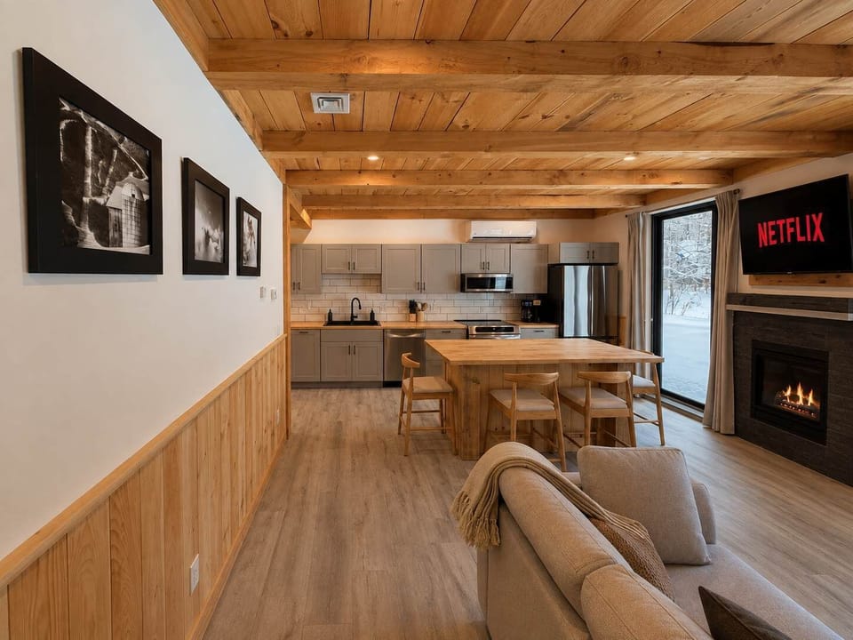 Living Room: Relax in a bright and inviting living room with comfortable seating, tasteful décor, and plenty of space to unwind after a full day of exploring the area.