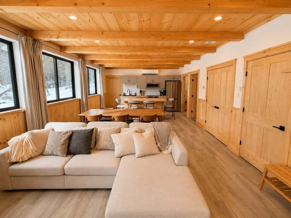 Living Room: Relax in a bright, inviting living room with comfortable seating, warm décor, and plenty of space to unwind after a day of exploring or spending time with family.
