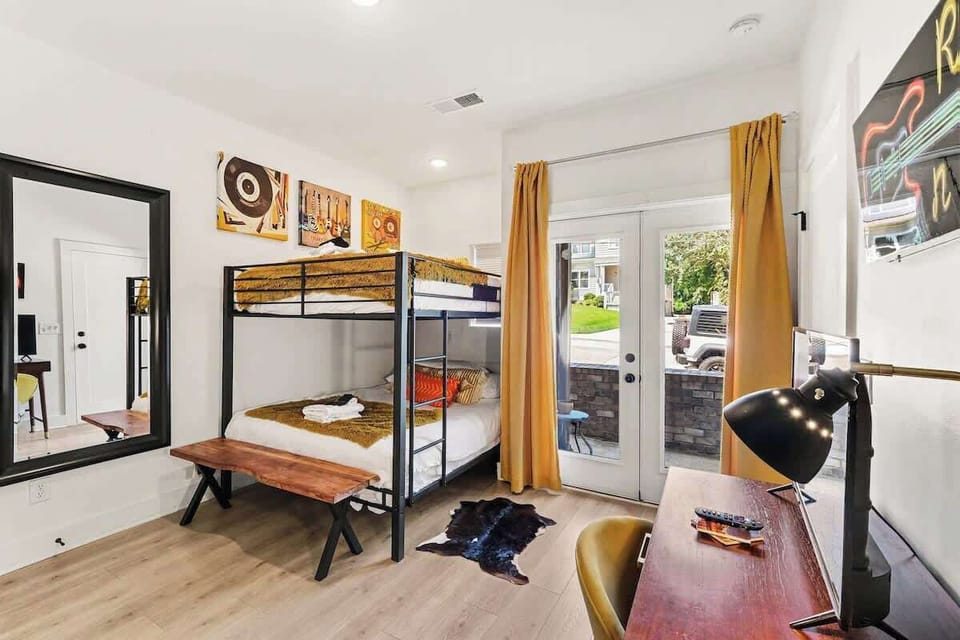 Bedroom 1: This welcoming bunk room offers comfortable beds, cozy bedding, and a great space for families or friends traveling together.