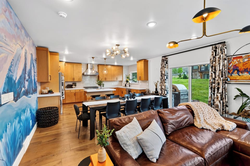 Open-concept living space looking into the kitchen and dining areas.