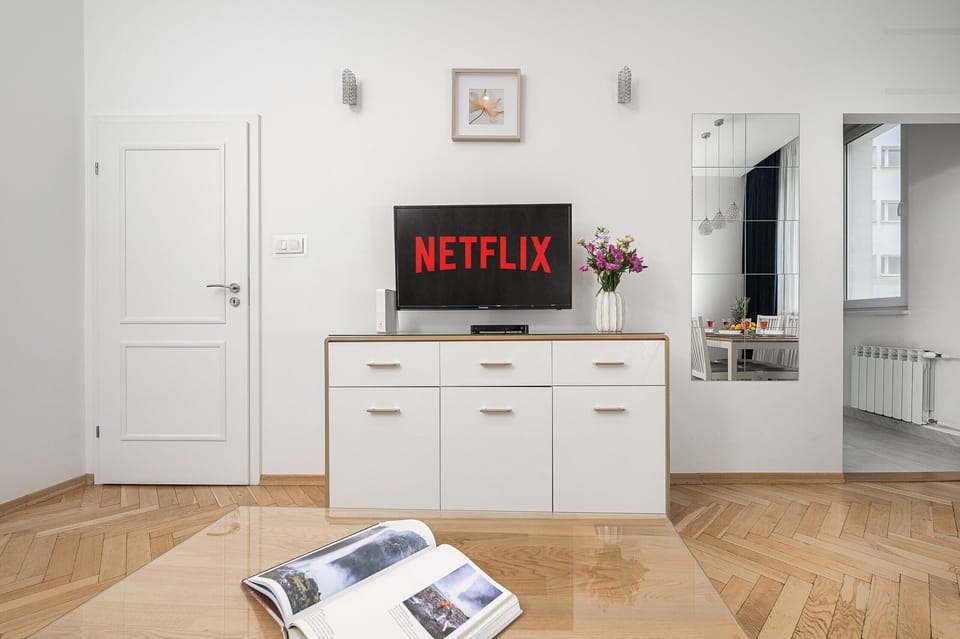 Classic Apartment, Balcony, City View | Living area | 40-inch LCD TV with satellite channels, Netflix, streaming services