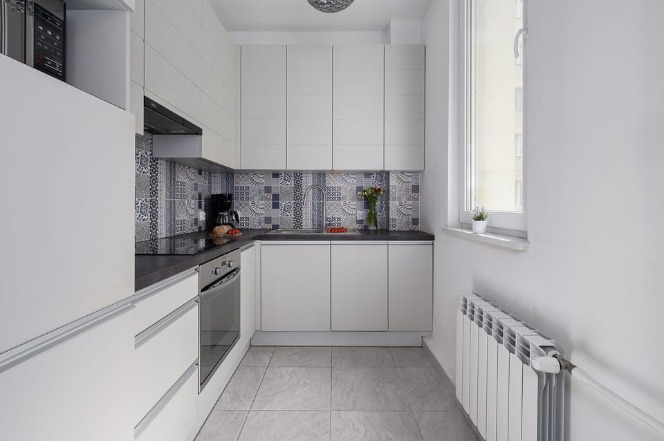 Classic Apartment, Balcony, City View | Private kitchen | Electric kettle, griddle, eco-friendly cleaning products, spices