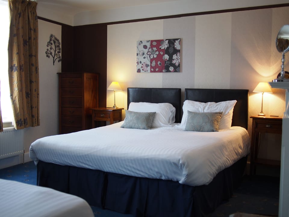 Family Room, Private Bathroom (Room 2) | Free WiFi, bed sheets