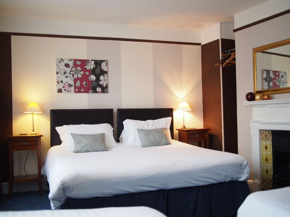 Family Room, Private Bathroom (Room 2) | Free WiFi, bed sheets