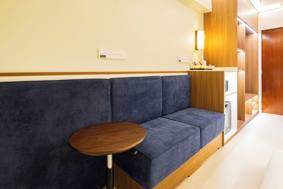 Deluxe Family Room (Skywell) | Minibar, in-room safe, WiFi (free), bed sheets