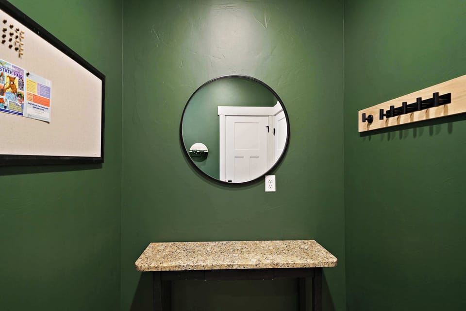 Half Bathroom 1: This clean and convenient half bathroom provides easy access to a toilet and sink, making it perfect for quick refreshes throughout your stay.