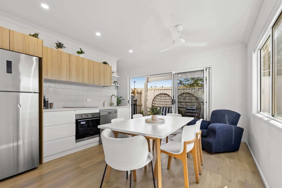 "Modern kitchen with adjoining dining area — ideal for home-cooked meals."