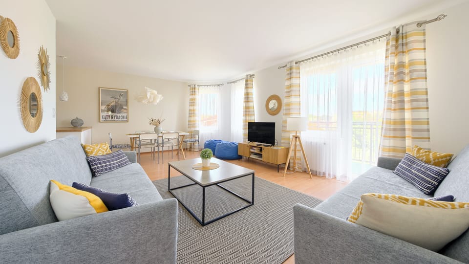 Apartment (12 A) | Living area | 30-inch flat-screen TV with digital channels