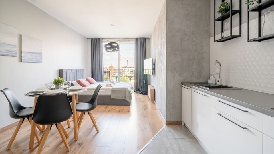 Studio Suite, Balcony | Living area | 30-inch flat-screen TV with digital channels