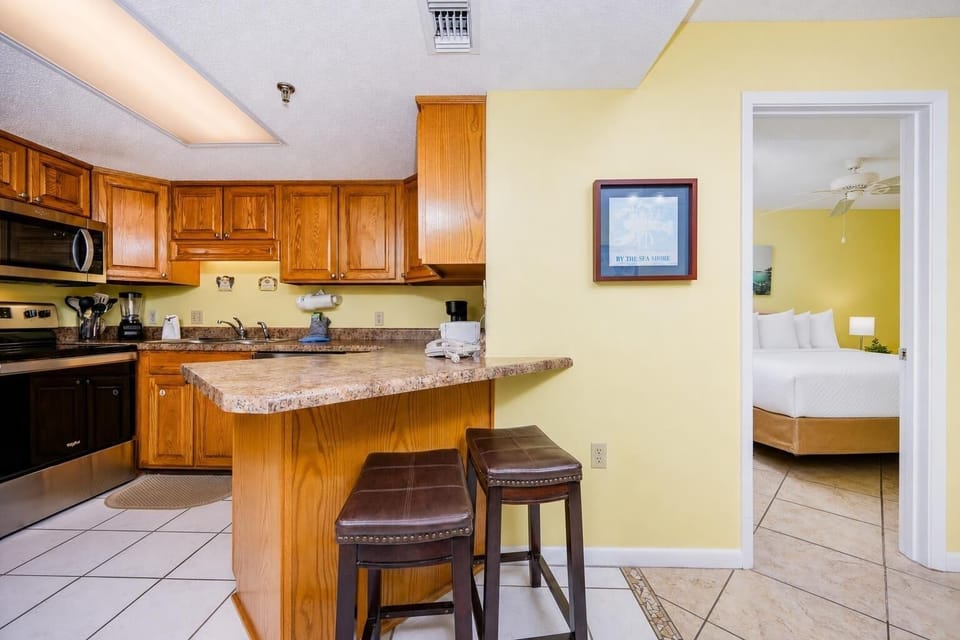 Condo, 2 Bedrooms | Private kitchen | Coffee/tea maker, fridge, oven