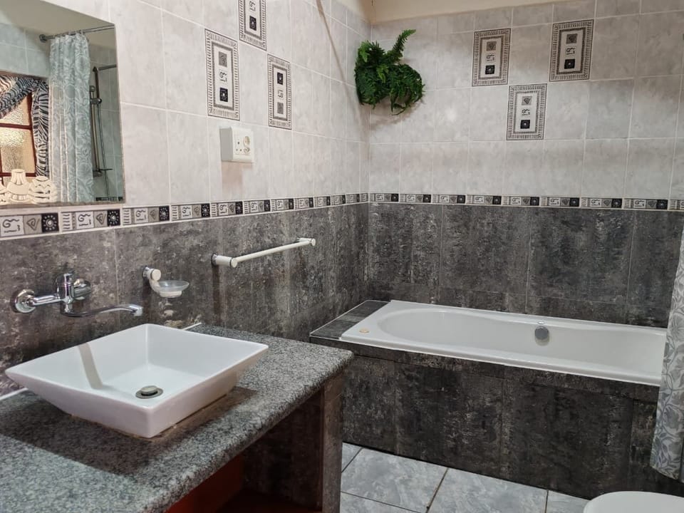 Family Room, River View | Bathroom | Combined shower/tub, toilet paper