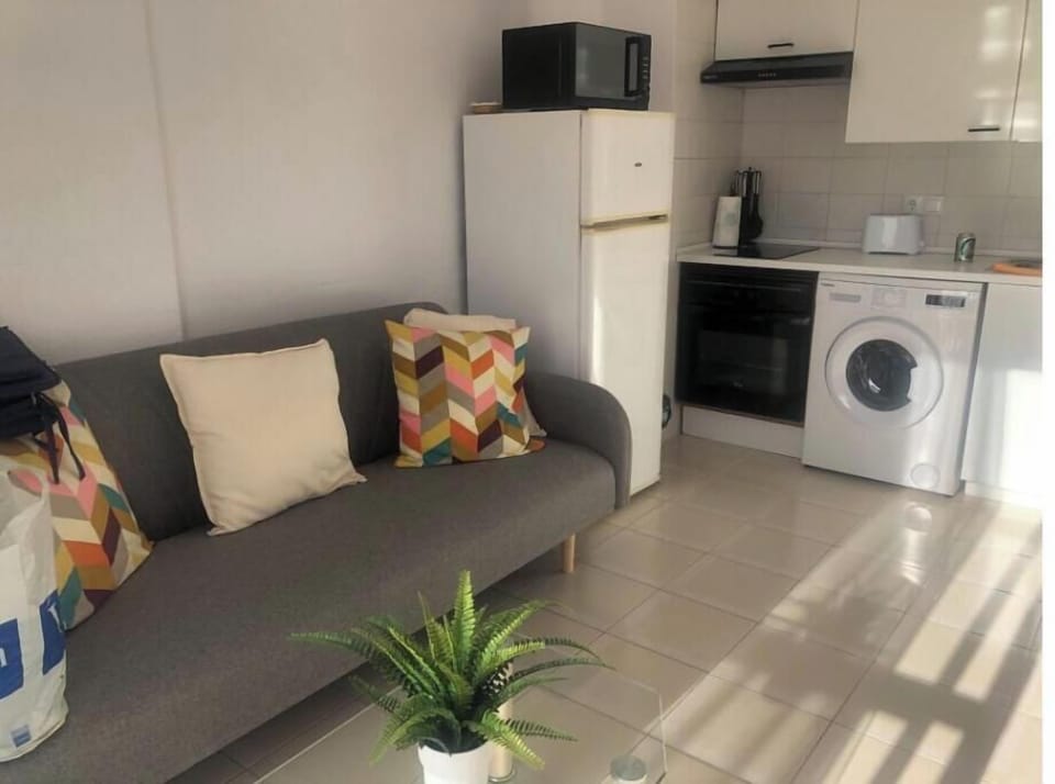 Kitchen with fridge freezer washing machine oven and hob