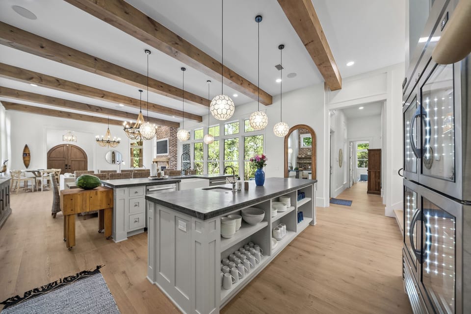 You'll love cooking in this stunning kitchen featuring a spacious island with storage and beautiful pendant lighting overhead.