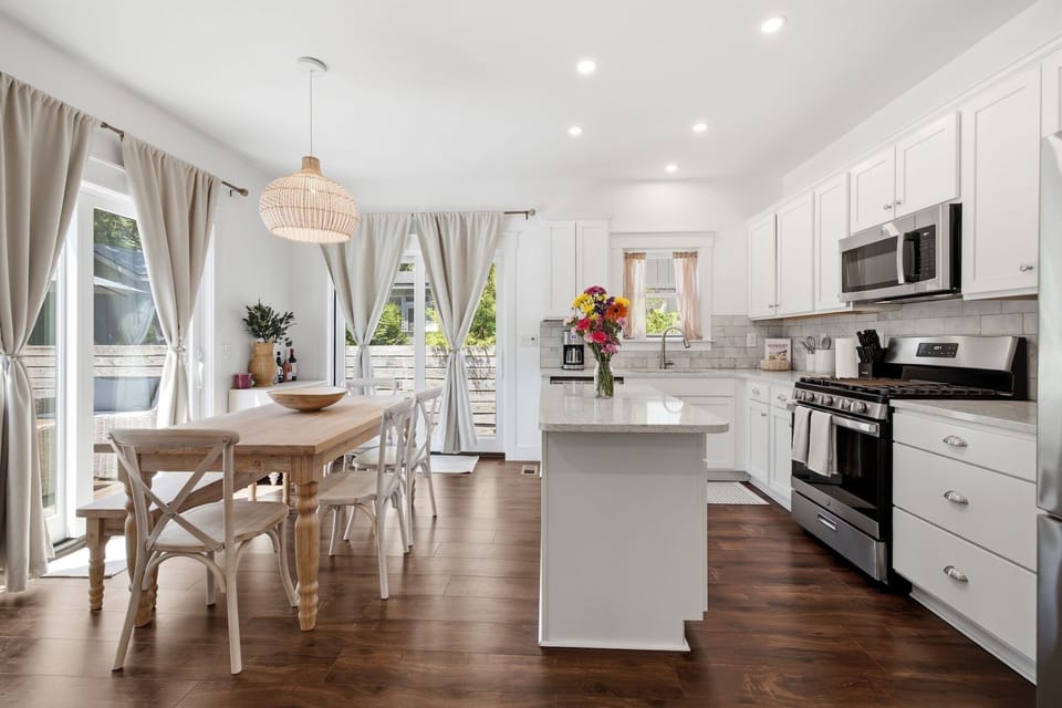 Whether you're brewing coffee, cooking a favorite meal, or sharing takeout from a local restaurant, this spacious kitchen is ready for it all.