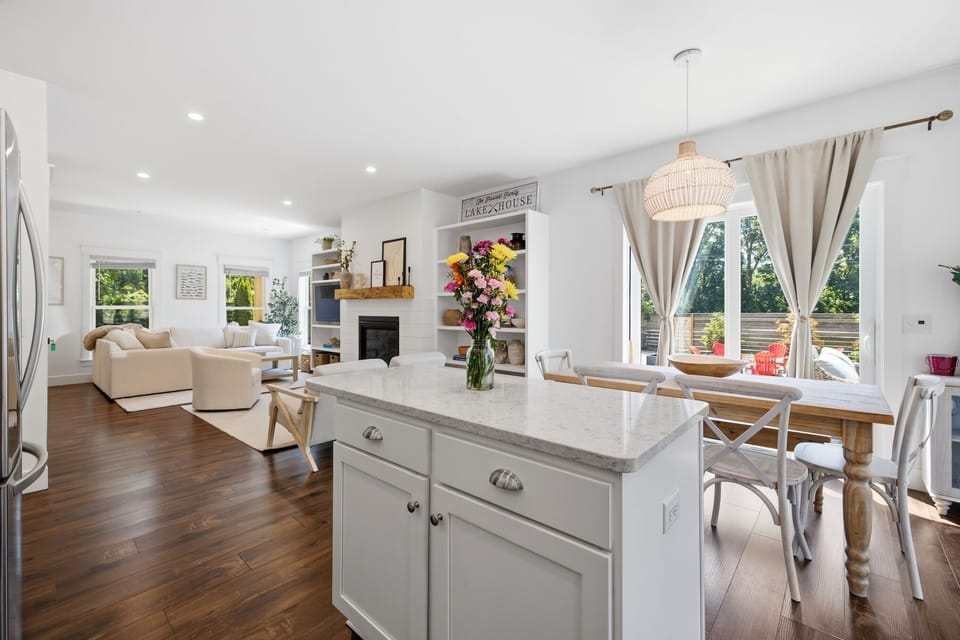 From breakfast at the island to movie night in the living room, this bright, open layout was made for making memories.