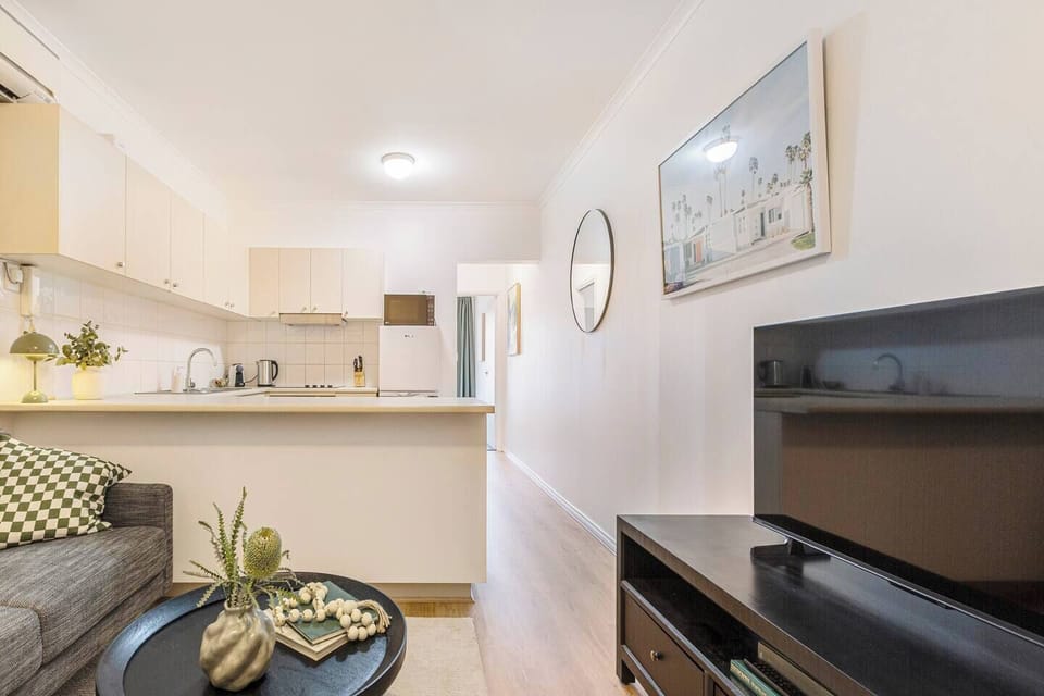 Settle in for a quiet night with your favourite show on the TV, enjoying a simple, comfortable space to switch off.