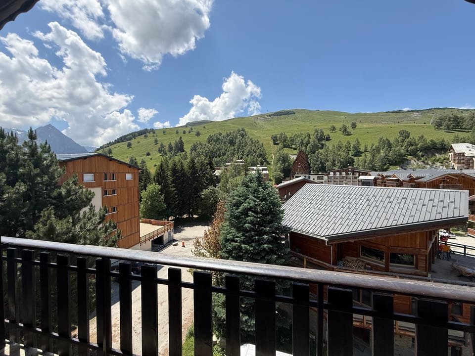 Step onto the west-facing balcony for mountain views and afternoon sun.