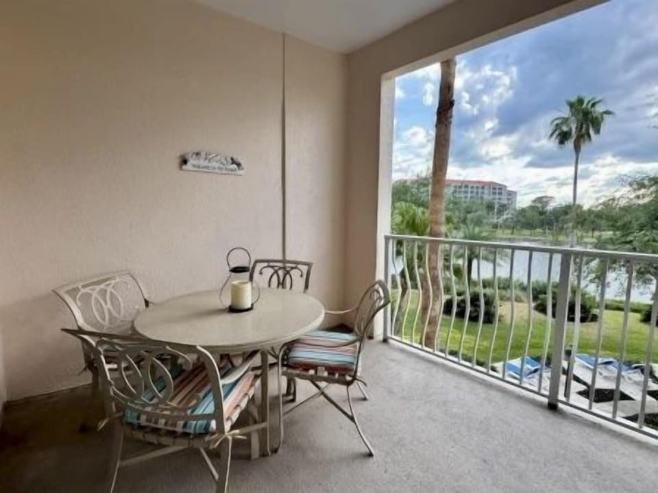 Private balcony with table and chairs overlooking the Intracoastal Waterway — morning coffee sorted