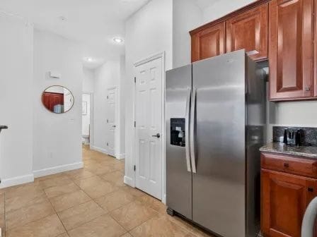 Second kitchen angle with full view of the counters, appliances, and open layout