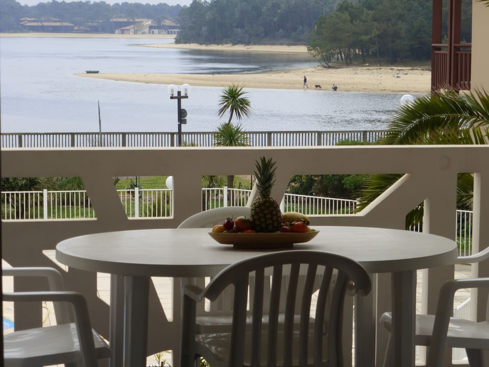 Steps from the lake beach and cycling paths, the furnished terrace is an easy spot for breakfast outdoors.