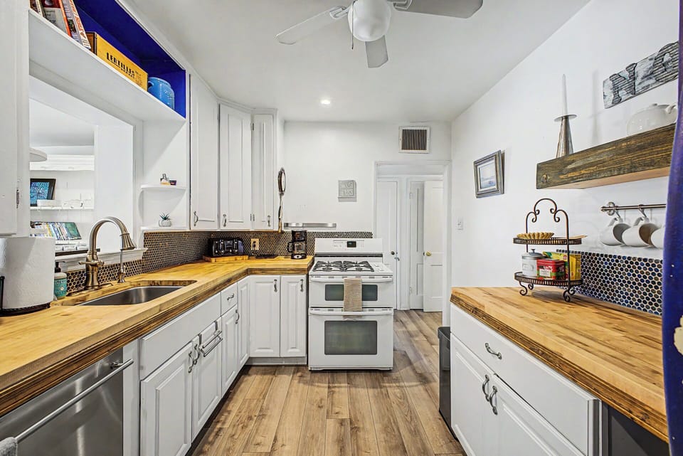 Prepare meals with ease in this bright, updated kitchen