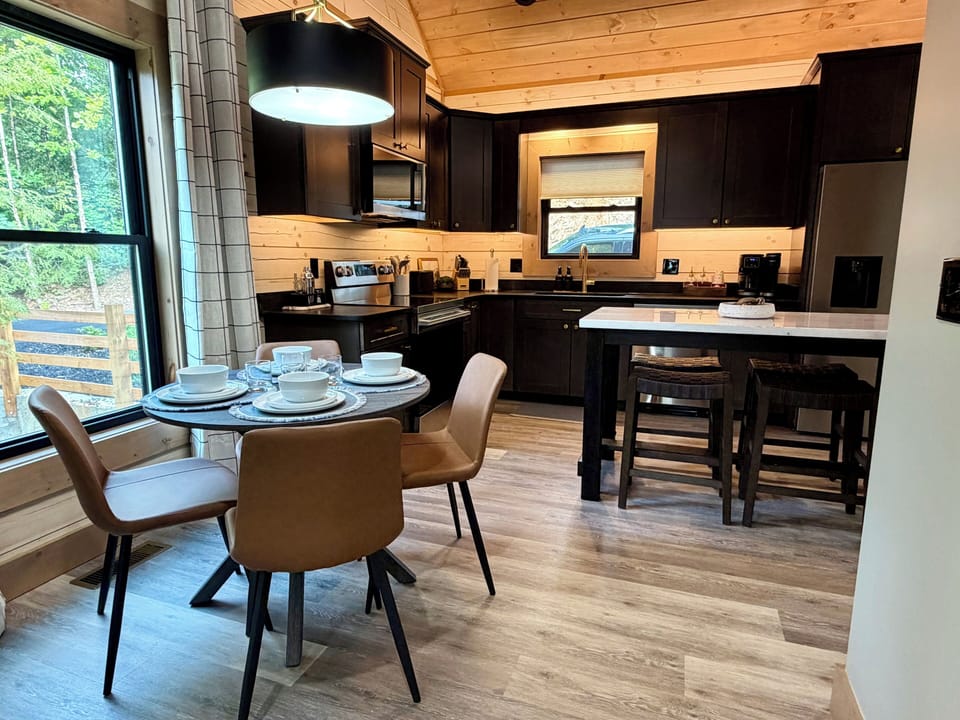 Dining area with seating for four. 