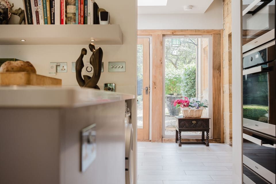 The double oven in the kitchen looking through to the garden room