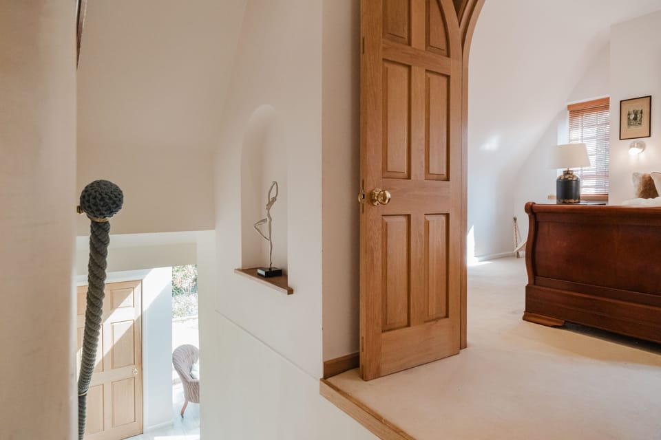 Stairs from the first floor, bedroom three is the first bedroom you come to