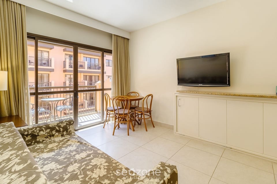 Basic Apartment | Living area | 40-inch TV with digital channels