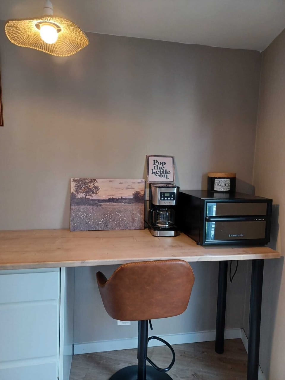 enjoy a snack in our kitchen area. breakfast bar with seating for 2