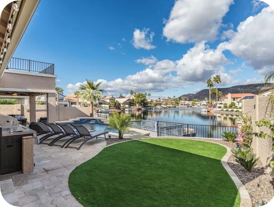 Expansive backyard views across the Arrowhead Lakes community