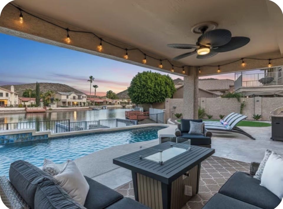 Covered patio seating for relaxed evenings beside the lake