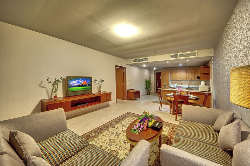 Standard Apartment, 1 Bedroom | Living area | TV, fireplace