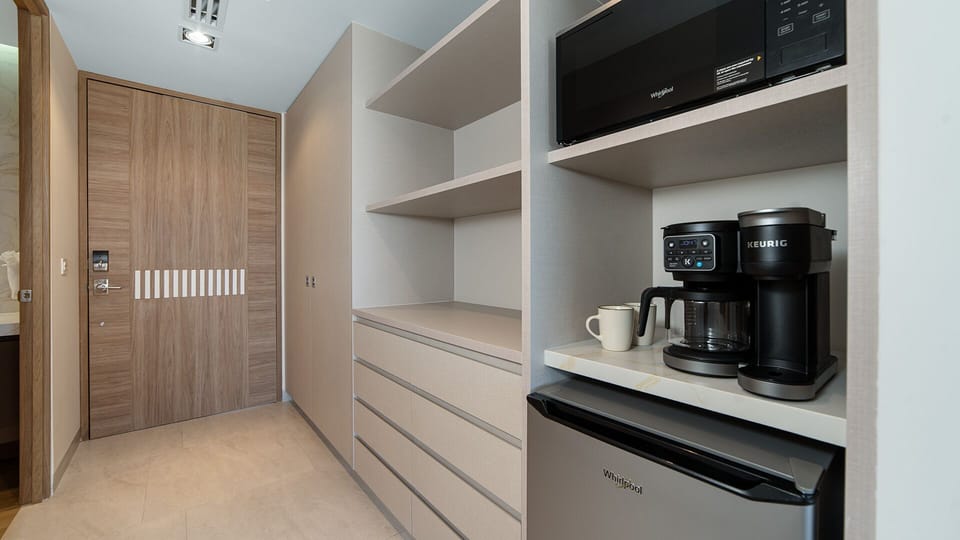 mini fridge, microwave and coffee maker